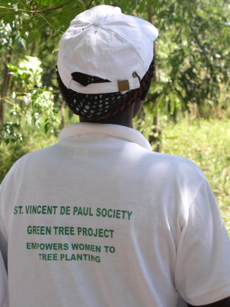 St Vincent de Paul Twinning back of woman's Green Tree Project shirt